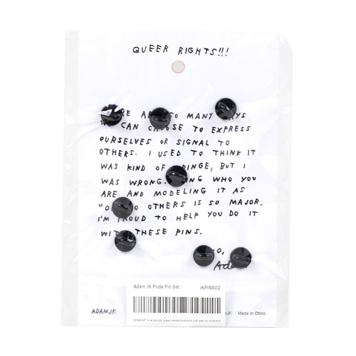 Back of pin packaging includes written note from Adam